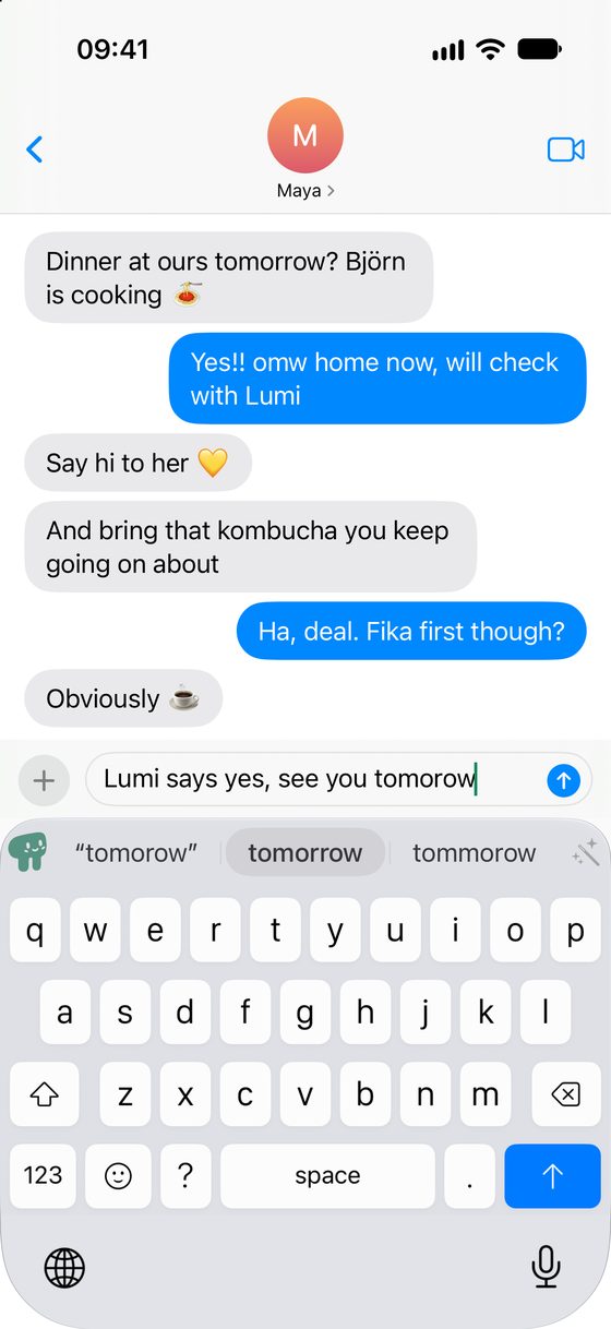 Pilcrow on an iPhone, in a message thread. The draft reads “Lumi says yes, see you tomorow”, and the suggestion bar offers the typed word in quotes, then the highlighted correction “tomorrow”, then “tommorow”.