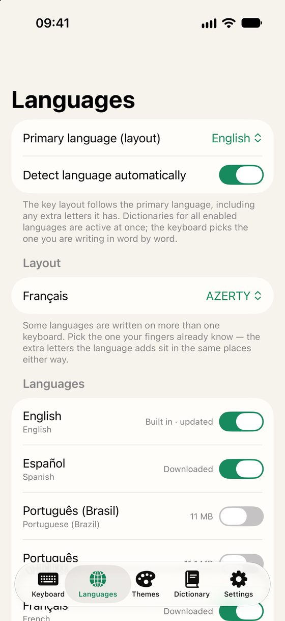 The Languages screen: a primary language and layout picker, a switch for detecting language automatically, and a list of languages with download sizes and toggles.